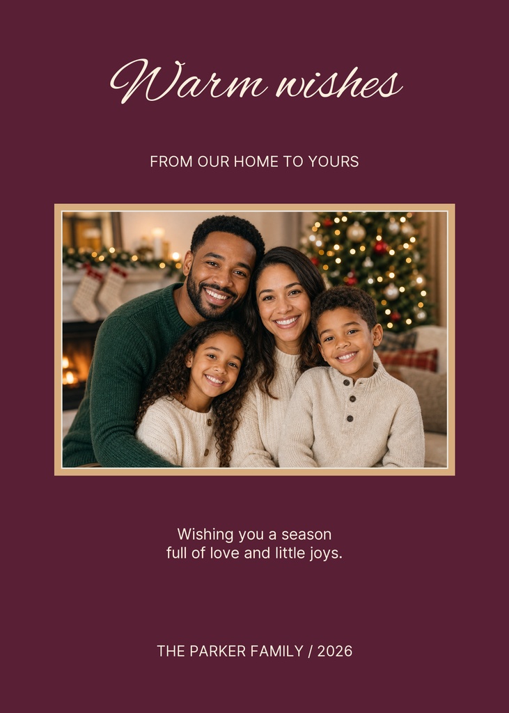 Portrait holiday card with a family photo, warm wishes headline, and seasonal greeting text on a burgundy background.