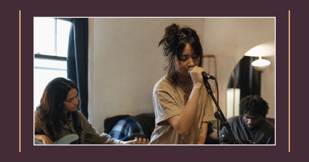 Landscape event cover with a singer at a microphone and musicians in the background
