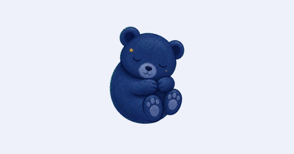 Blue teddy bear sitting on a light background with sleepy eyes
