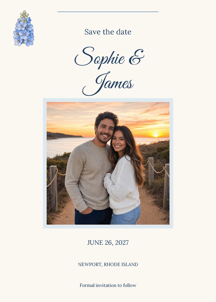 Portrait save the date card with blue floral accents and a couple photo at sunset