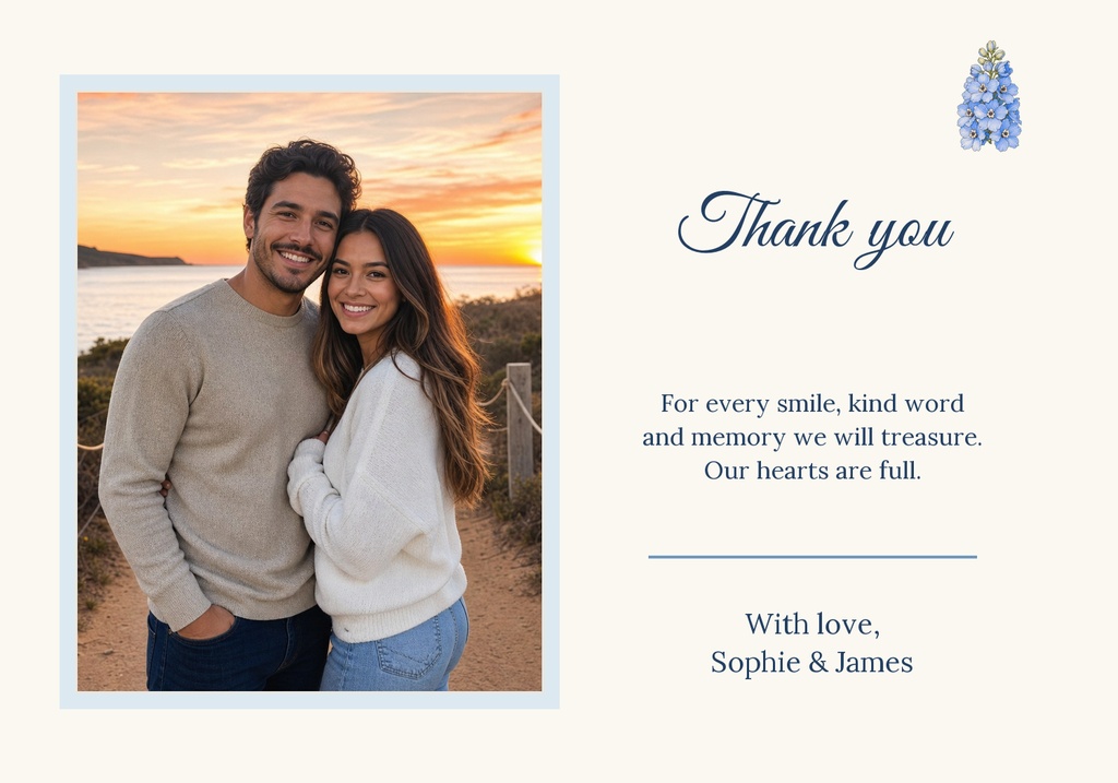 A landscape thank-you card with a couple photo, blue floral accent, and elegant script text.
