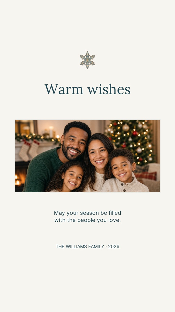 Vertical holiday card with a snowflake, warm wishes text, family photo, and winter greeting message.