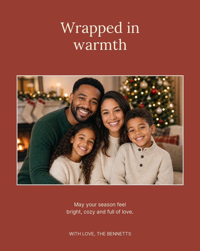 Family portrait on a warm red holiday card with the words Wrapped in warmth.
